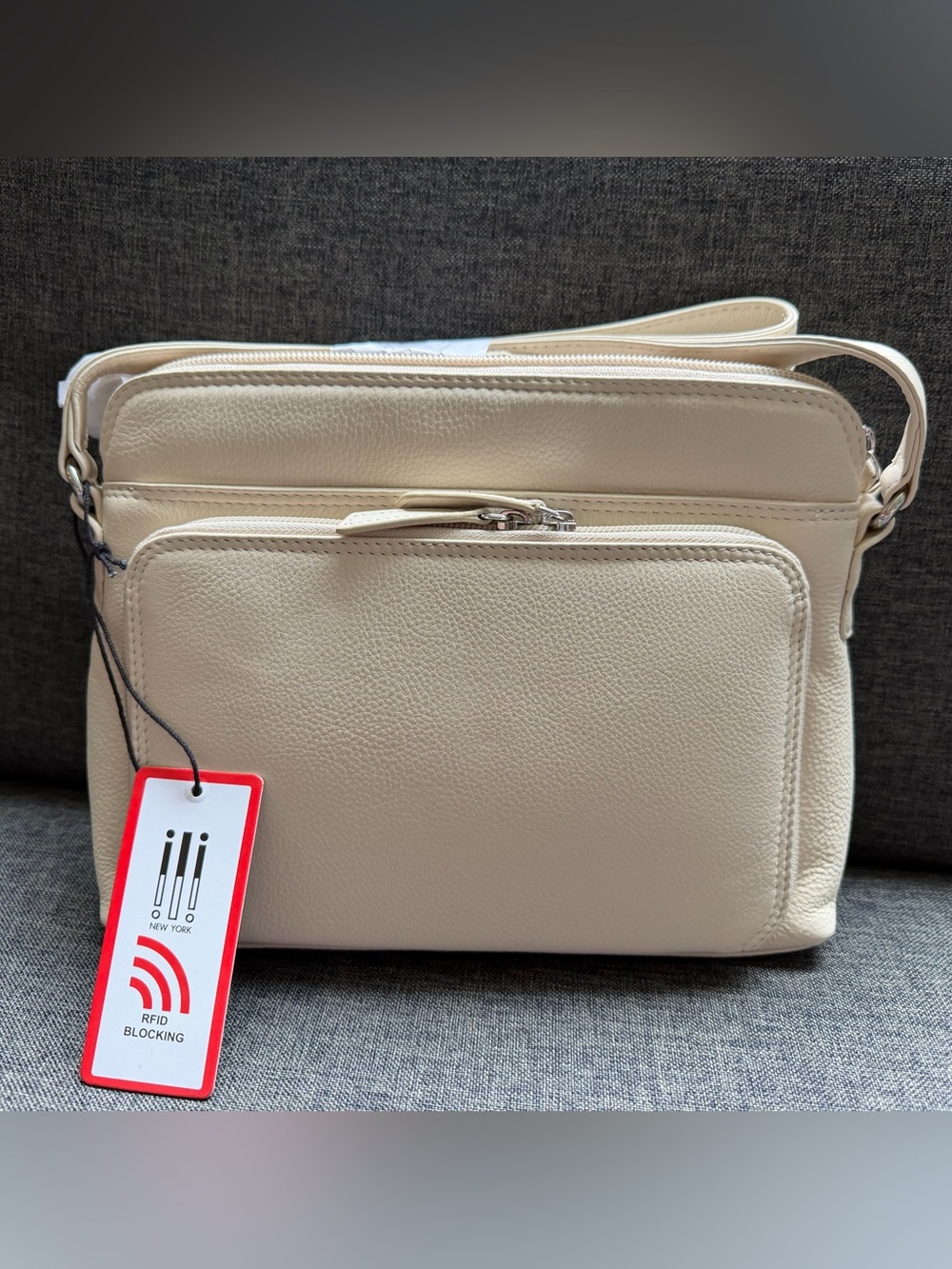 ili New York RFID Blocking Crossbody Organizer bag in “Bone”. NWT.